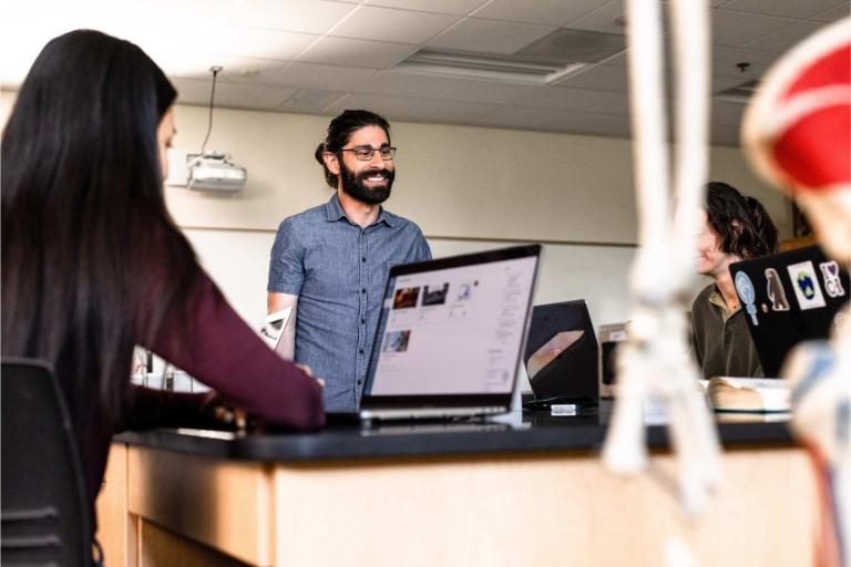 teacher with students in lab